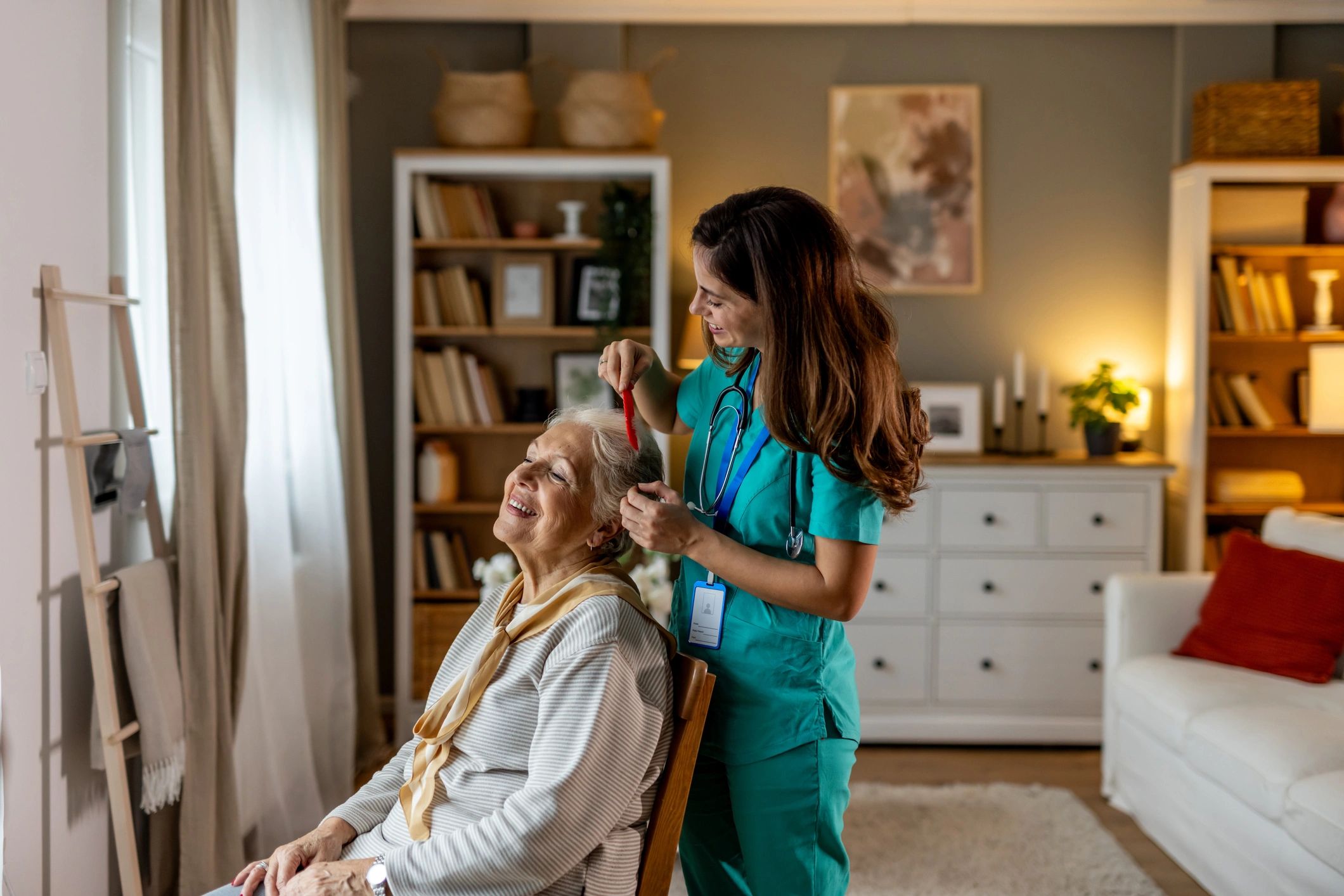 Caregiver supporting a senior at home